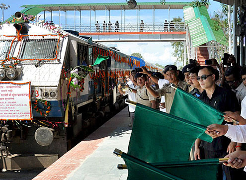 Union Minister of State for Sports and Youth Affairs, Sarbananda Sonowal along with RS Birdi GM NF Railway flagging off the Murkongselek- Guwahati Inter City Express and Murkongselek-Dekargaon Express at Murkongselek Railway Station (PTI Photo)