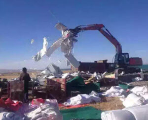 Chinese work crew tears down ‘illegal’ Tibetan structures near Qinghai Lake in an undated photo. Photo courtesy of an RFA listener